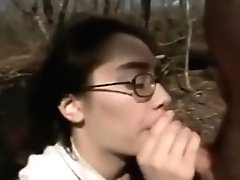 Nerdy Woman Chicks Spunk Across Her Face In Forest